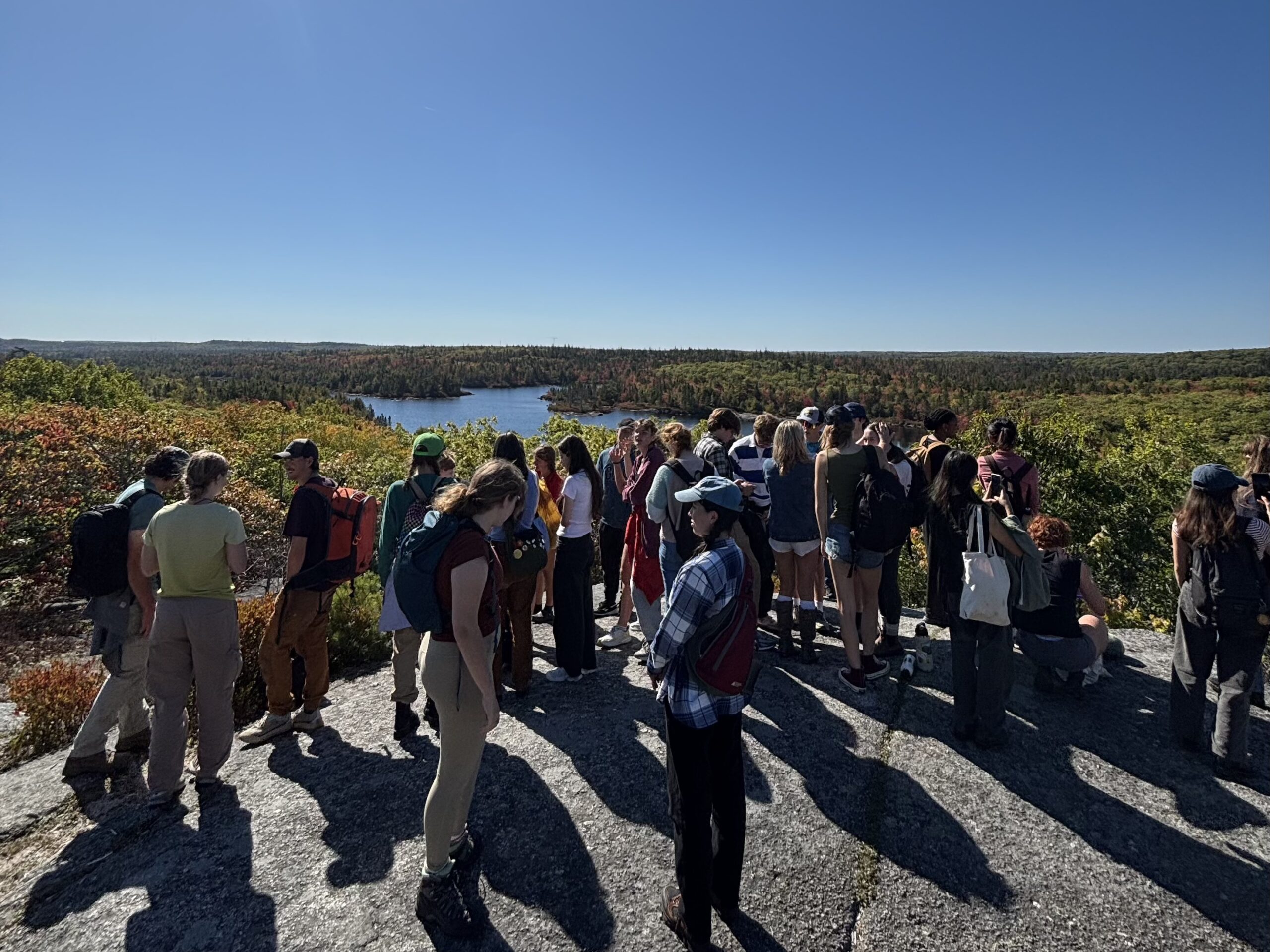 Students from Kings College stop at a look-off during a guided hike in BMBCL with CPAWS-NS (October, 2025).